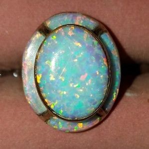 Simulated Opal like stone set in .925 silver
